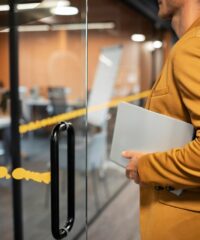 close-up-man-carrying-laptop_23-2149097900